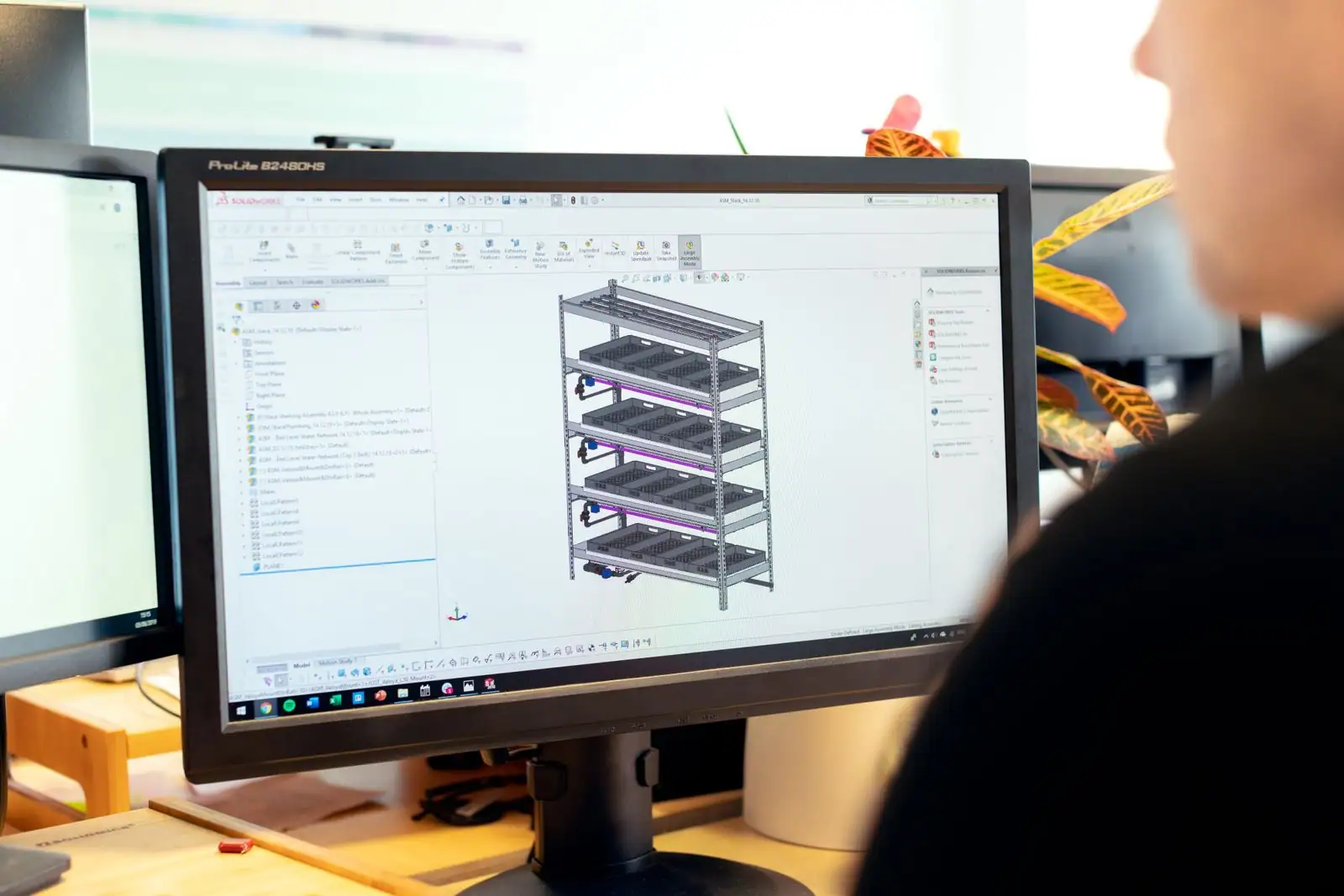 Logiciel de modélisation 3D affiché à l'écran d'un ordinateur, avec un modèle en volume
